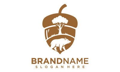 Brown bear walks under tree in stylized acorn logo design © Tegar