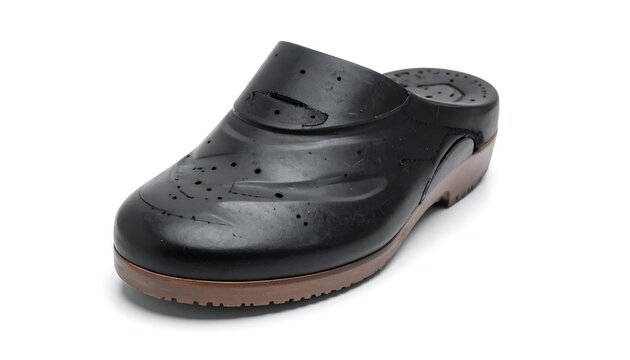 A single, dark-colored clog featuring a wooden sole and a rubber upper with decorative perforations. The shoe sits on a white background