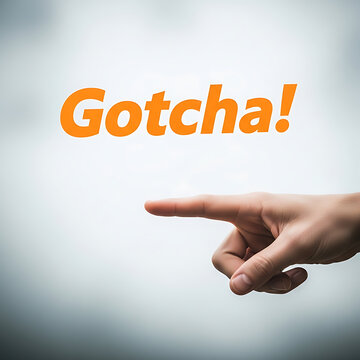 Gotcha! Text with Finger Pointing Against Cloudy Sky Background
