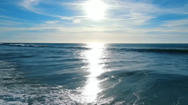 Ocean waves under bright sun ideal for eco-friendly campaigns and travel vlogs