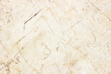 Fototapeta premium An antique and stained brown parchment page with a grunge texture of old paper and rough vintage wood pattern on a blank retro backdrop surface