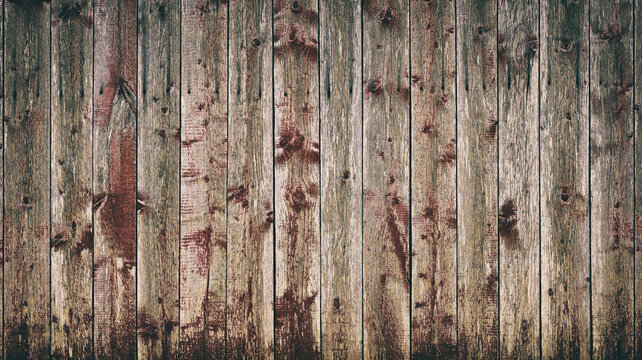 Weathered, rustic and knotty wood plank background. Reclaimed wood from an old barn.