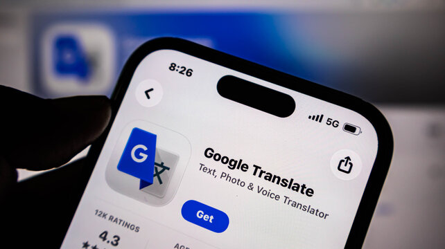 Closeup of a smartphone screen displaying the google translate app store page with the get button visible