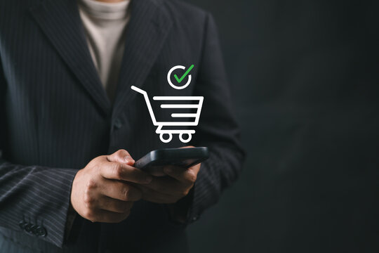 User confirming online order on smartphone with success icon, representing ecommerce checkout, payment approval, and completed digital transaction.