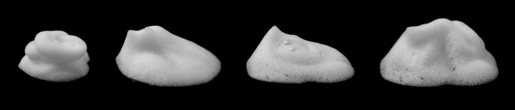 Realistic white soap foam isolated on black background, detailed bubble texture with cleaning foam shapes for cosmetic, hygiene, shampoo, detergent, wash effect, abstract overlay design.