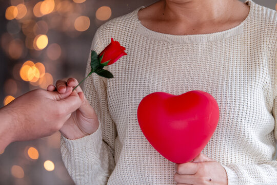  Woman Holding Red Heart While Receiving Rose, Romantic Valentine Concept With Bokeh Lights