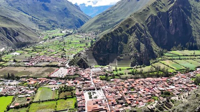 Panoramic aerial view of the town of Ollantaytambo and its Inca terraces, Cusco, Peru

