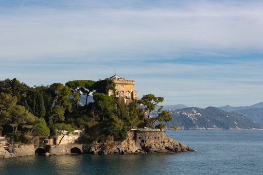 View from Paraggi beach across the bay to Punta Costello near the village of Portofino.