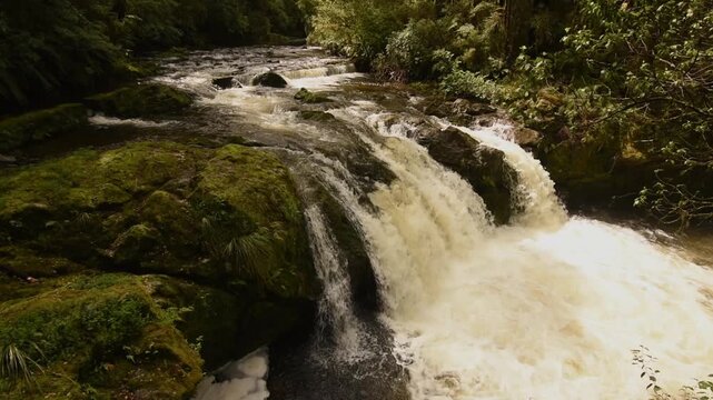 The old, disused weir on Six Mile Creek, Murchison, New Zealand. The weir originally provided the head of water for the hydroelectric power station downstream.