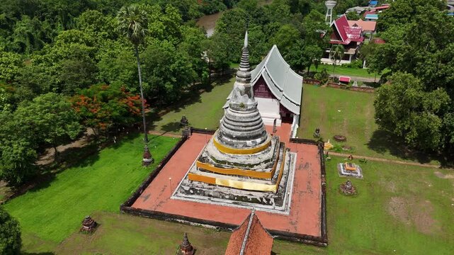Aerial view of sacred pagoda enshrined the Buddha's relics in Wat Phra Fang temple in Uttaradit province of Thailand. Built since 1700 B.E. during Sukhothai period.