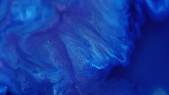 Ink flow. Pigment liquid. Blue acrylic stream mix spill blend. Color shimmering splatter diffusion abstract emulsion defocused background.