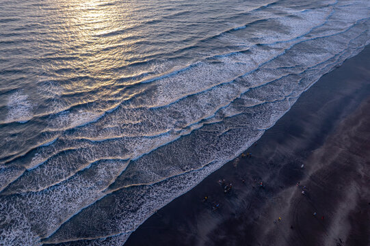 A stunning aerial drone view of Dapoli Beach along the Konkan coastline in Ratnagiri district, Maharashtra, India.