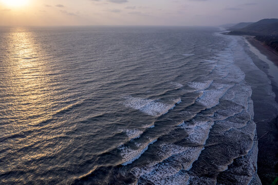 A stunning aerial drone view of Dapoli Beach along the Konkan coastline in Ratnagiri district, Maharashtra, India.