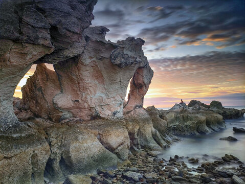 Sunset Over Batu Termanu Coastal Rock Arch on Rote Island
