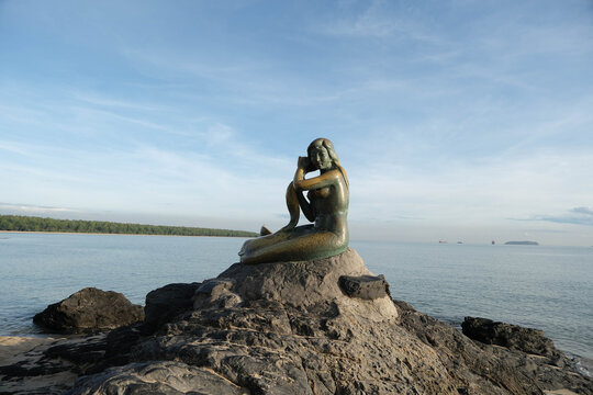 The iconic Golden Mermaid statue on Samila Beach, Songkhla, Thailand