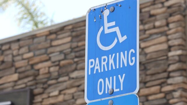 Blue Disabled Parking Only Sign During Day.