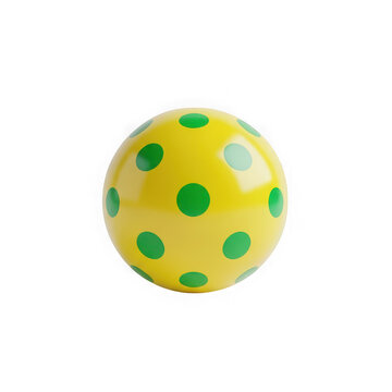 Bright yellow ball with green polka dot pattern for sports or play isolated on a clean simple background