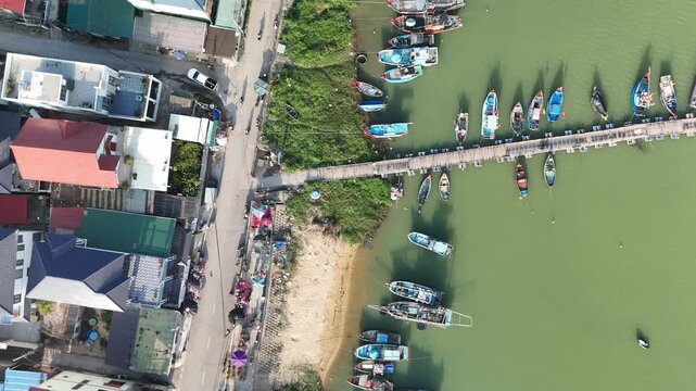 Nam Trach, Quang Binh (Quang Tri), Vietnam &ndash; 4K aerial drone footage of river mouth, East Sea, sandy beach, fishing village, boats, beachfront roads and seaside landscape near Dong Hoi City