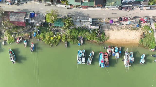 Nam Trach, Quang Binh (Quang Tri), Vietnam &ndash; 4K aerial drone footage of river mouth, East Sea, sandy beach, fishing village, boats, beachfront roads and seaside landscape near Dong Hoi City