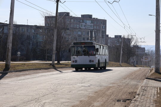 Trolleybus city street. Old green trolleybus. a functioning Soviet-era trolleybus. High quality photo