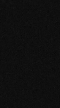 Abstract black grainy texture overlay for cinematic effects and digital noise