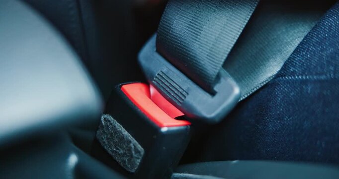 Hands, seat belt and woman in car for safety with travel, driving or protection of accident. Transport, road law and closeup of person with fastening buckle for security in vehicle for journey.