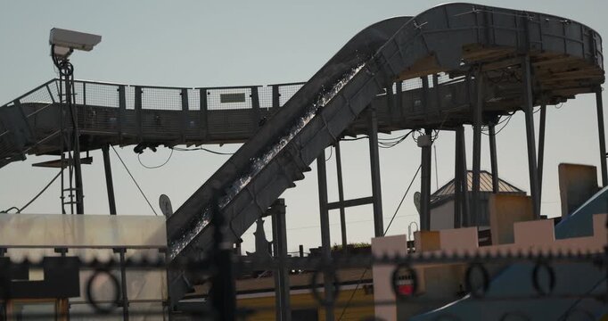 Slow motion shot of water coming down the log flume at littlehampton amusement park