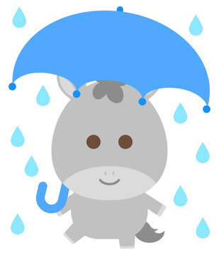 雨の日のかわいい馬（芦毛）