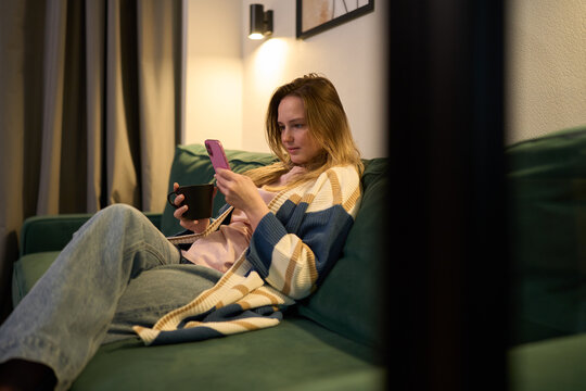 Cozy Evening Scrolling Reels on the Sofa