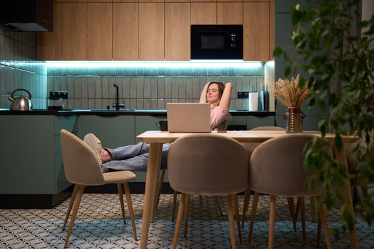 Coffee break recovery in cozy kitchen after screen work
