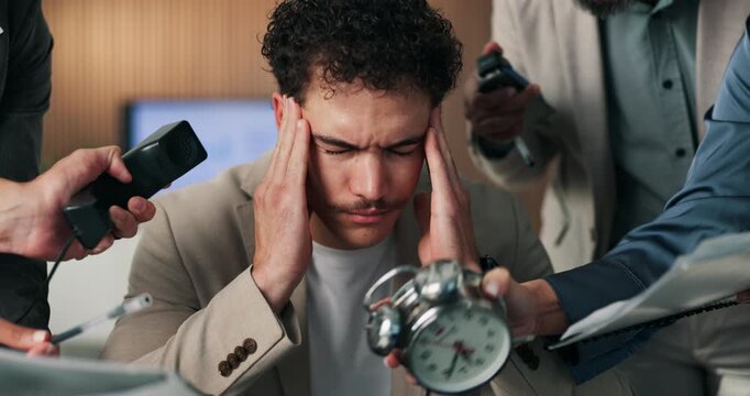 Headache, stress and businessman with clock in office for finance project with deadline. Workload, time management and male financial manager with colleagues for chaos with migraine in workplace.