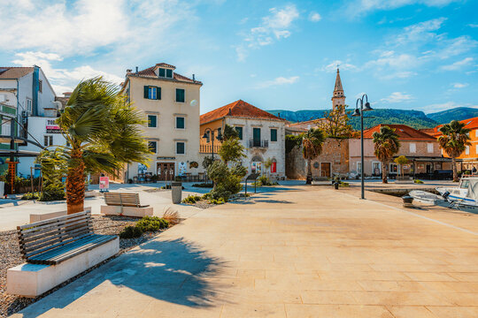 Jelsa town on Hvar island, with traditional Dalmatian stone architecture and boats moored in the harbor, Croatia.