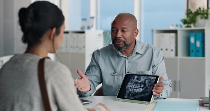 Dentist, patient and tablet screen with xray in office for mouth analysis, tooth structure and implant. People, checkup and talk with digital scan of wisdom teeth, cavity detection and dental results