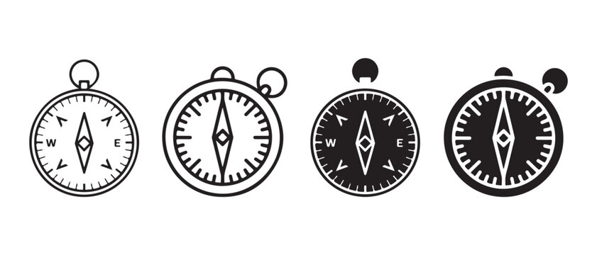 Set of four black and white compass icons for navigation and travel design.