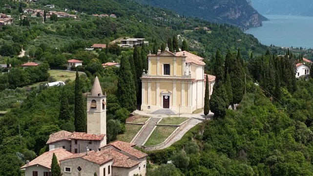 Aerial view of European culture and sacred architecture at the village center of Gaino Toscolano Maderno