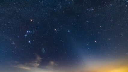 Fototapeta premium Orion constellation and Milky Way stars on a dark countryside skies.