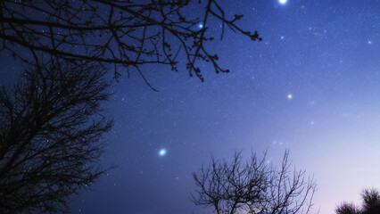 Fototapeta premium Constellations, zodiacal light and Milky Way stars on a dark countryside skies.