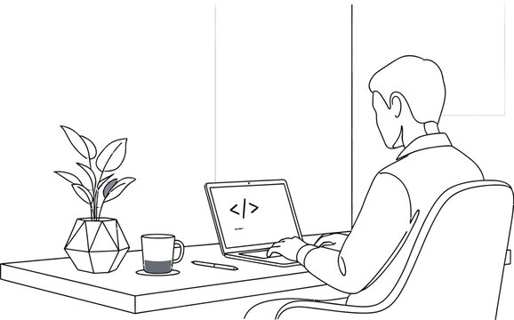 Professional software developer sits at a desk while focused on writing new computer code using a modern laptop in office