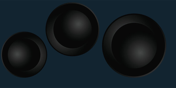 Three Black Circular Speaker Cone Shapes.