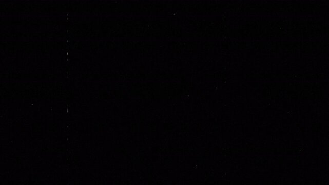 Old 8mm film look, Tv signal with vertical bad interference, Static noise background. Old film grain overlay grunge background. 