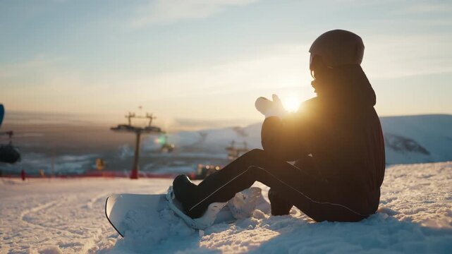 Snowboarding in luxury ski resort, sportswoman get ready to ride slope, at top. Athletic woman admiring fascinating view from peak of mount, tourist excursion and alpine skiing, enjoy calmness