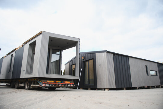 Modular house sections transporting on flatbed truck