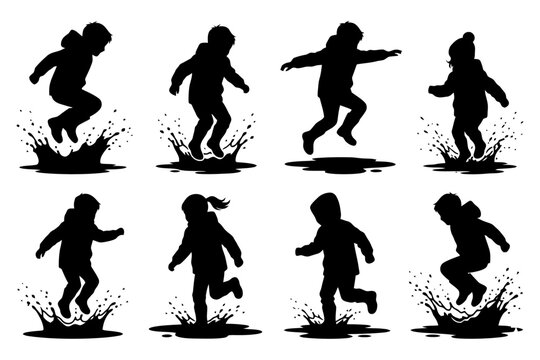 Silhouette of children jumping and playing with splashing water.