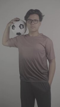 Southeast Asian person is carrying soccer ball on his shoulders S-Log3, S-Gamut3.Cine