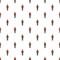Fototapeta premium Holiday nutcracker toy soldiers creating a festive repeating uniform pattern