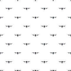 Obraz premium Repeating pattern of flying drones on a white background, representing modern technology and surveillance
