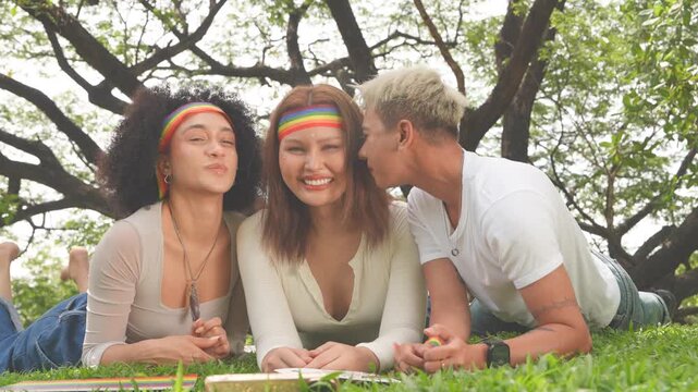 Latina women in love with cross-dressing men and tomboys, happily kissing and wearing Pride flags and celebratory outfits for parades in parks, all part of the Pride and LGBTQ festival concept