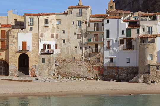 View of houses of old town from pier, Cefalu, Sicily, Italy