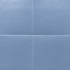 Fototapeta premium Textured blue paper background with copy space