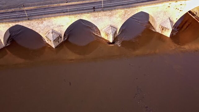 The medieval bridge in Tordesillas, Spain, during a rise in the water level of the Duero River